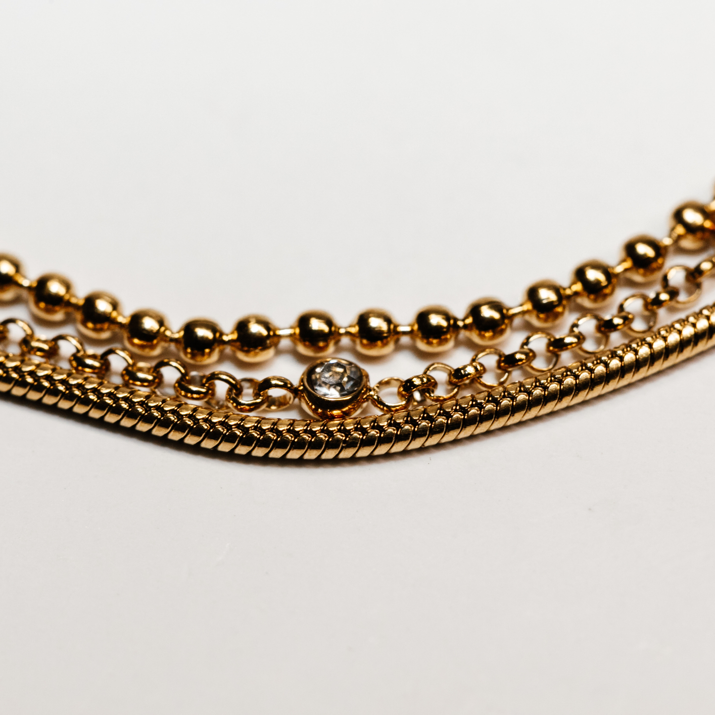 Liora Luxe Bracelet gold layered chains with crystal accents elegant jewelry