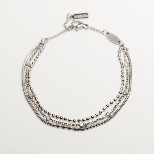 Liora Luxe Bracelet in silver with layered chains and delicate crystals sparkling elegantly