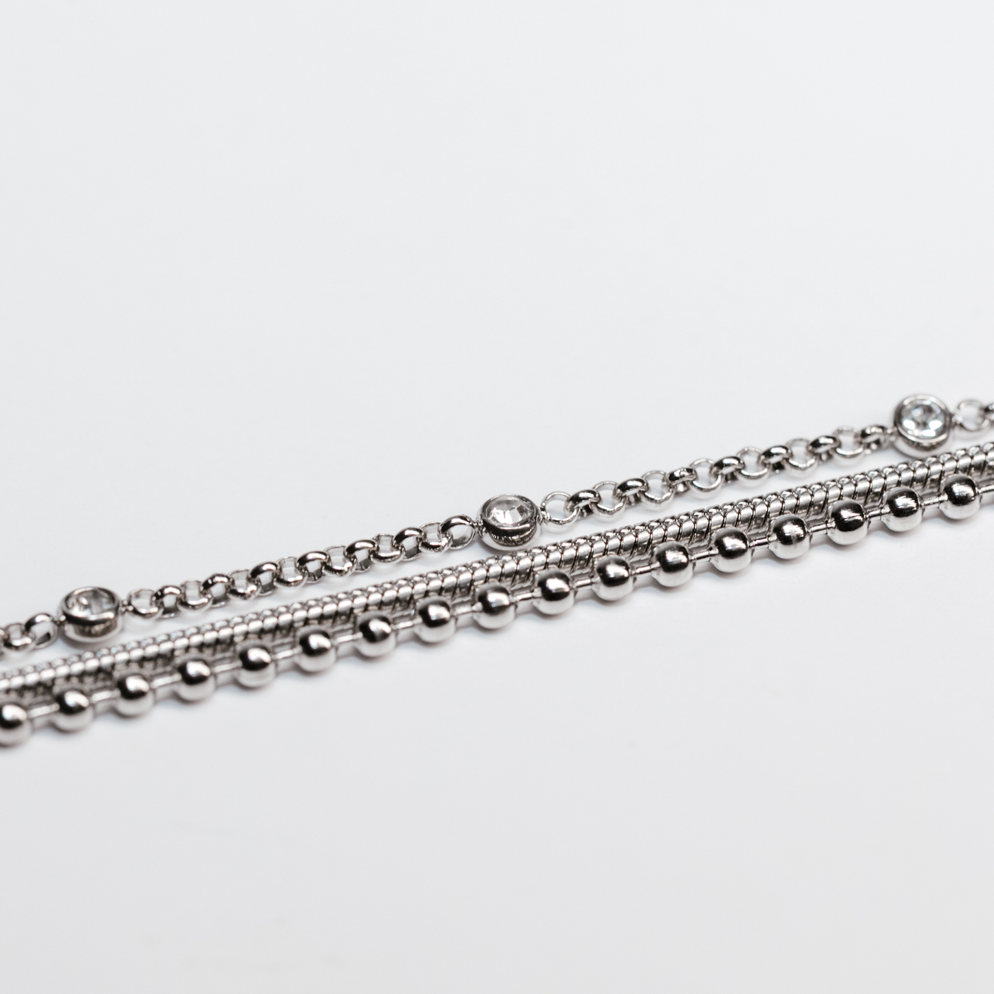 Liora Luxe Bracelet silver layered chains with crystal details and soft shimmer