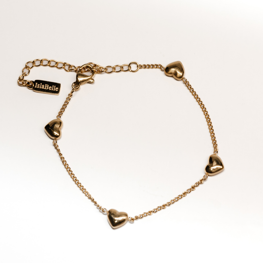 Amoura Chain Bracelet in gold with delicate heart charms on fine chain