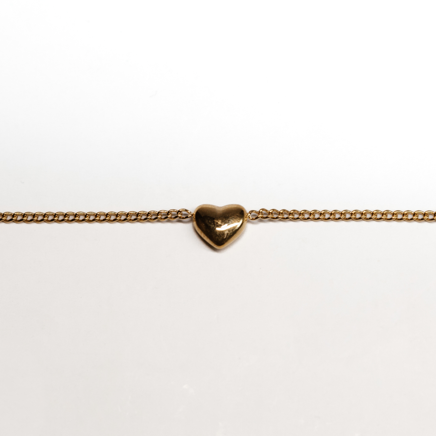 Amoura Chain Bracelet in gold with petite heart charms on a fine chain