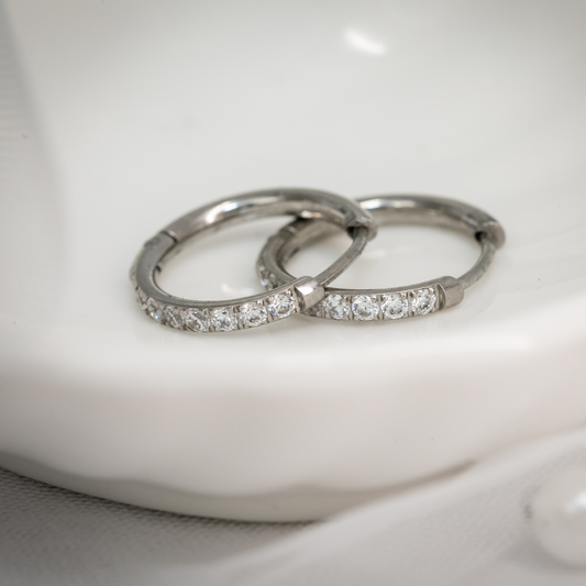 Éclat Hoops silver crystal huggie earrings with sleek, polished finish