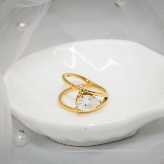 Aurora Solitaire Ring in gold with oval crystal and split band design