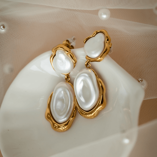 Callista Pearl Drops gold earrings with luminous pearls and organic curves