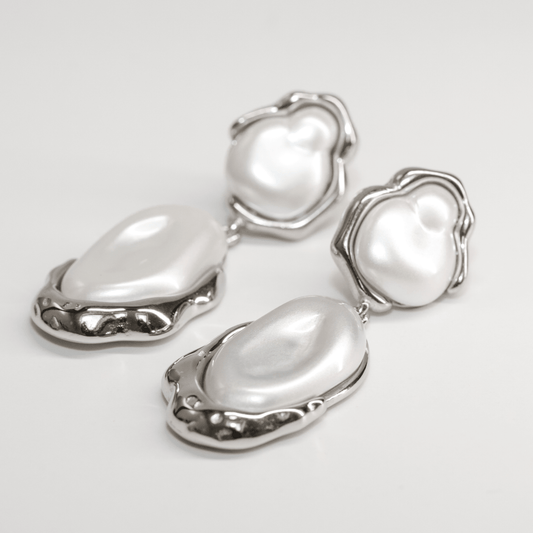 Callista Pearl Drops silver earrings with glowing pearls and smooth fluid lines