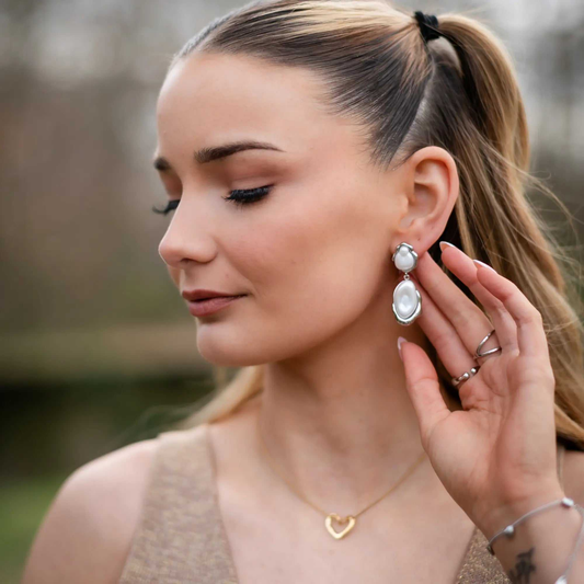 Callista Pearl Drops silver earrings with glowing pearls and smooth fluid lines