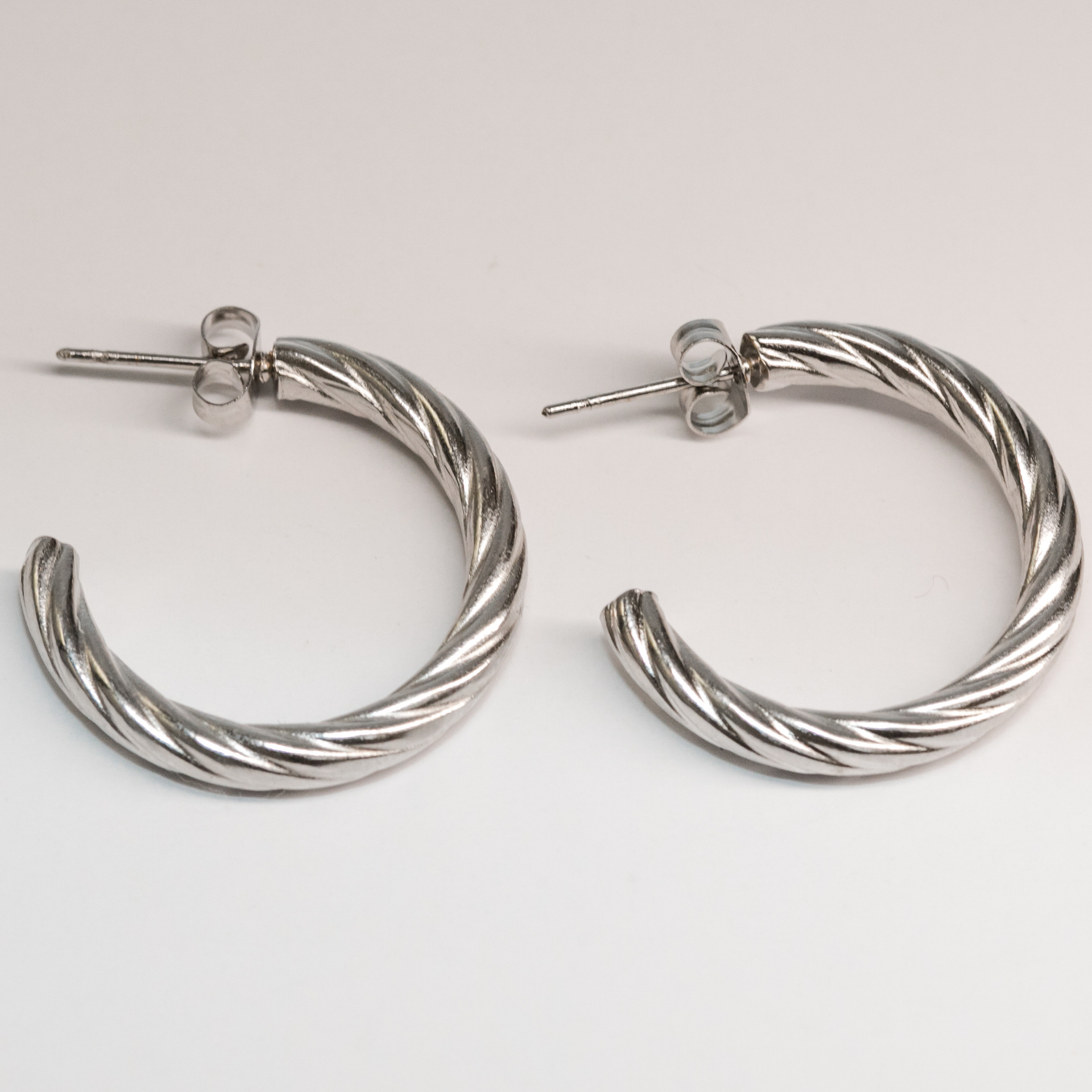 Vera Twist Hoops In Silver